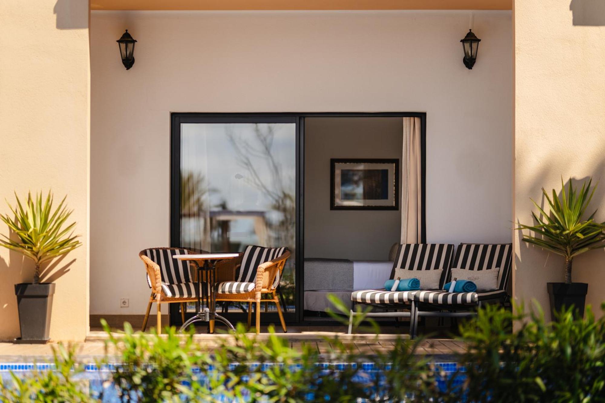 Secrets Mallorca Villamil Resort & Spa - Adults Only Peguera Ngoại thất bức ảnh A sliding door